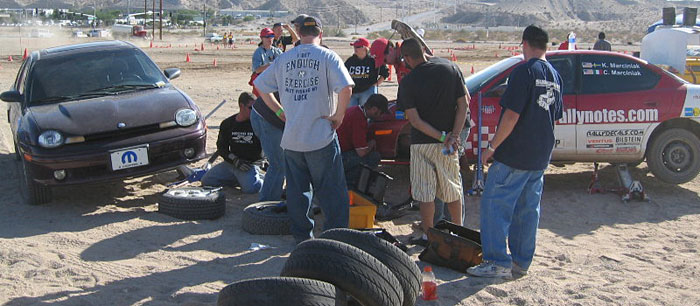 Neon axle swap at a rallycross